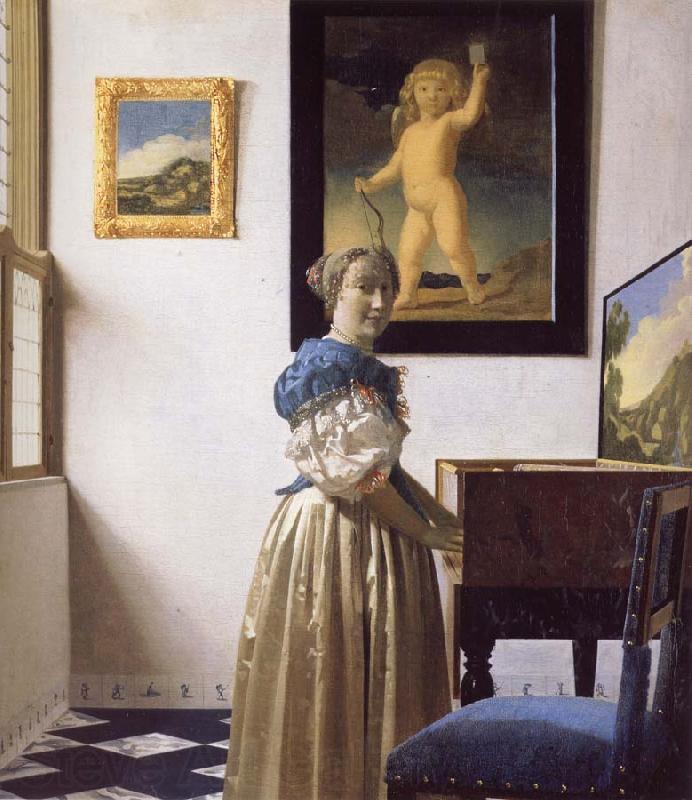 JanVermeer A Young Woman Standing at a Virginal